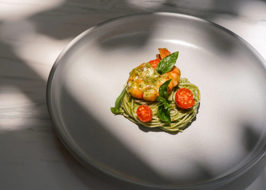 Prawn spaghetti with pesto, tomato and basil served at Brisa Brunch every Sunday at CIRE restaurant in Alila Villas Uluwatu, Bali, Indonesia