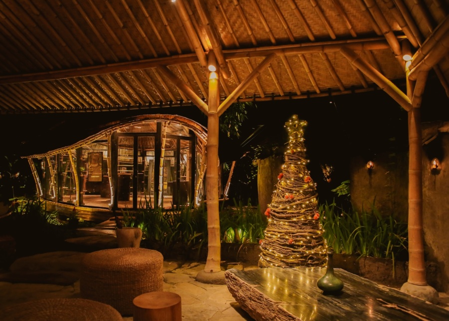 Christmas tree and bamboo interiors for Christmas Eve at Tembaga Restaurant at Bambu Indah in Ubud, Bali, Indonesia