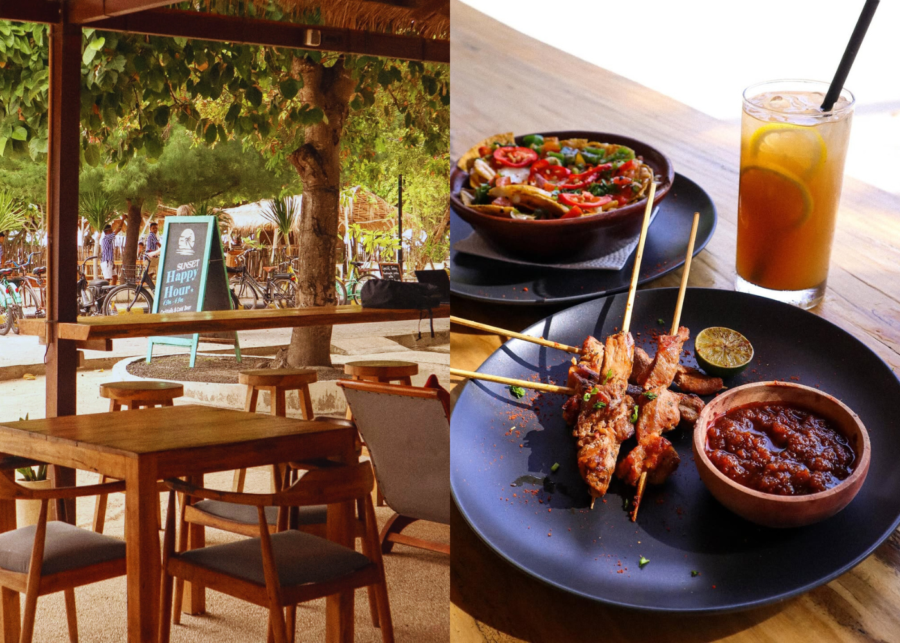 Outdoor seating area at Gili Teak with satay skewers, sambal and iced tea served on a wooden table.