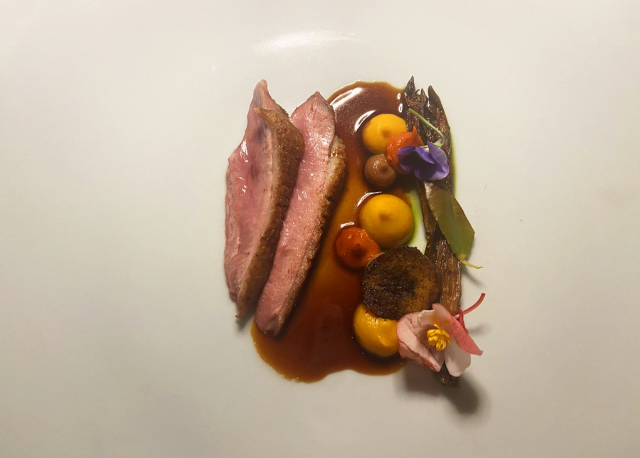 Duck dish served at Kubu at Mandapa, A Ritz-Carlton Reserve - a fine dining restaurant in Ubud, Bali, Indonesia