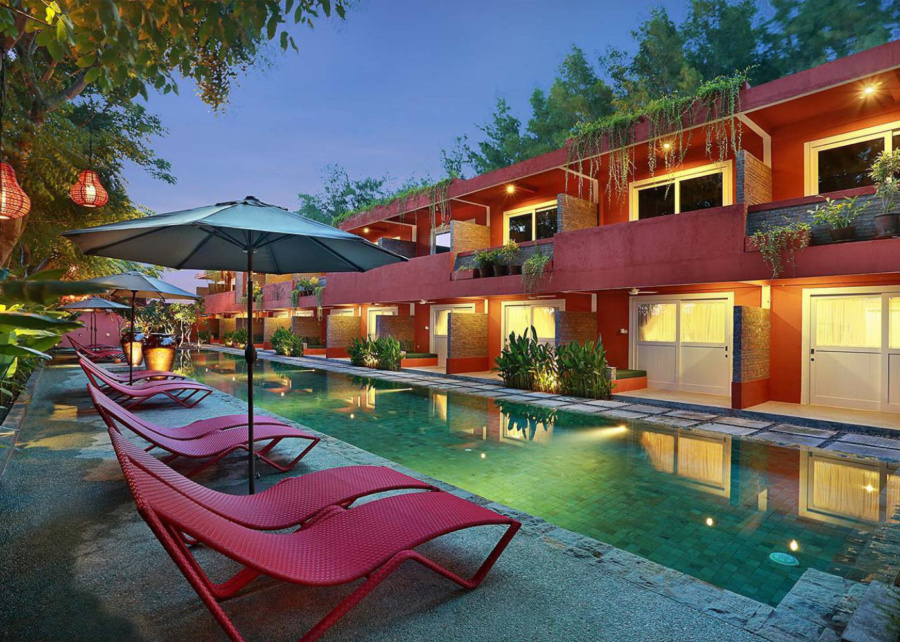 Pink sun loungers by the lagoon pool at PinkCoco Gili Trawangan Hotel, Lombok, Indonesia