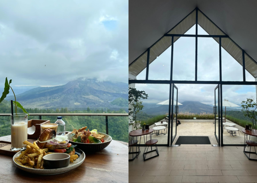 A table set with coffee and brunch dishes overlooking Mount Batur in Kintamani, alongside a café interior with floor-to-ceiling windows framing mountain views.