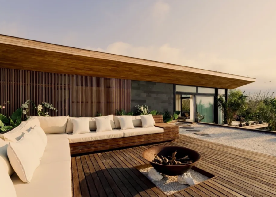 Summer Ulu in Uluwatu featuring modern Mediterranean-inspired architecture, warm wood textures and a sunset deck lounge.