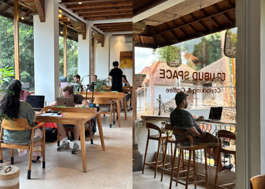 People working on laptops at wooden tables inside Ubud.Space coworking and coffee in central Ubud.