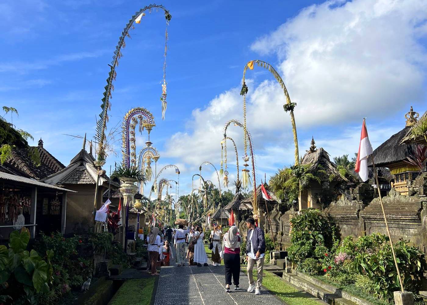 Penjor lining the main street in Desa Penglipuran village in Bali, Indonesia, for Galungan and Kuningan celebrations