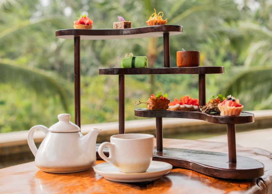 cakes and pastries for afternoon tea overlooking the jungle at Jati Bar in Four Seasons Bali Resort at Sayan, Ubud