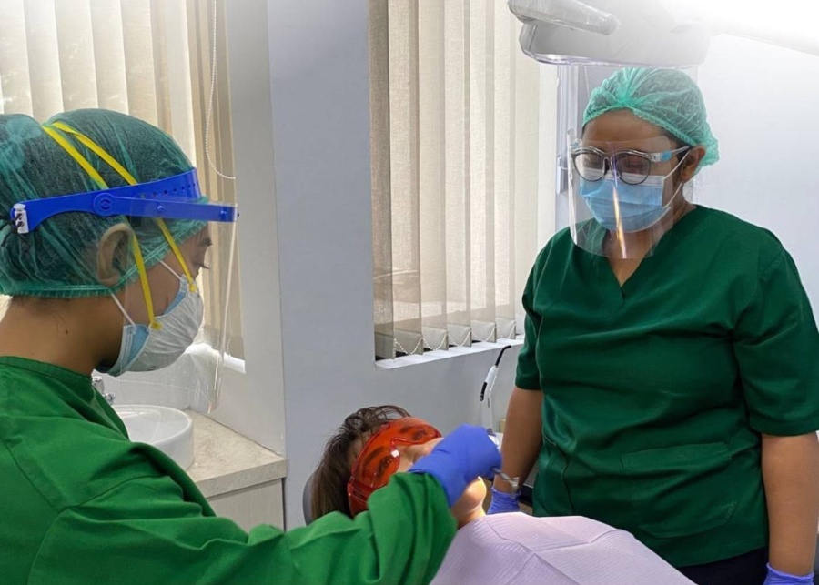 Dentists giving dental treatment at Rejuvie Clinic in Sanur and Kuta, Bali, Indonesia