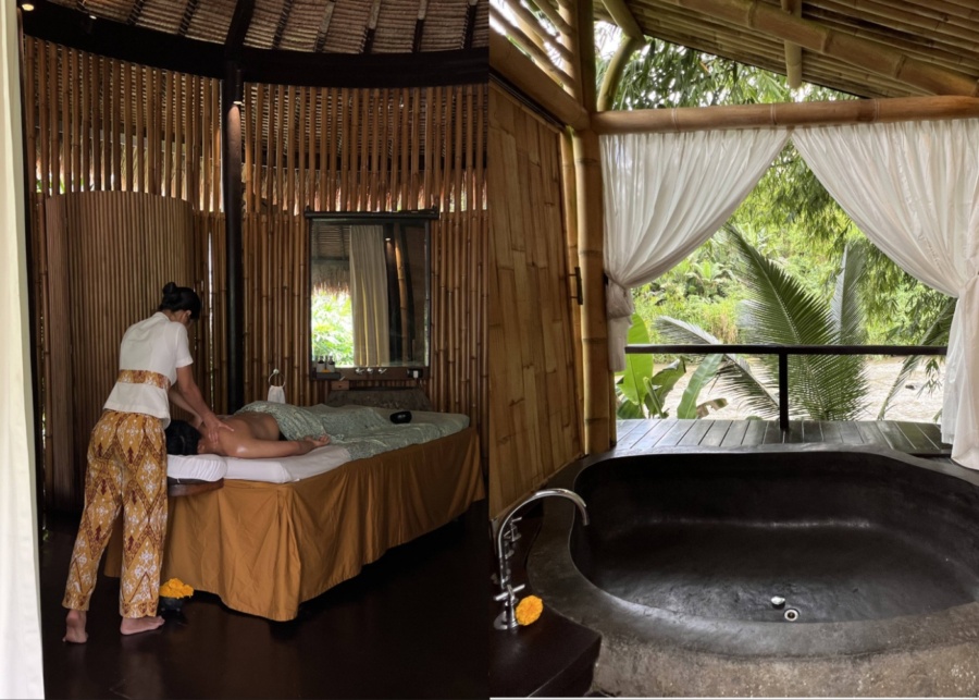 Getting a massage and open air bath by the river at the spa at Fivelements Bali in Ubud