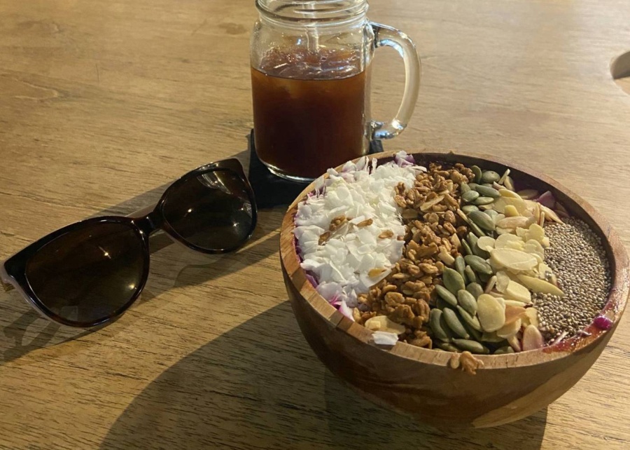 Healthy smoothie bowl and iced coffee at Paradise Bali cafe in Sanur