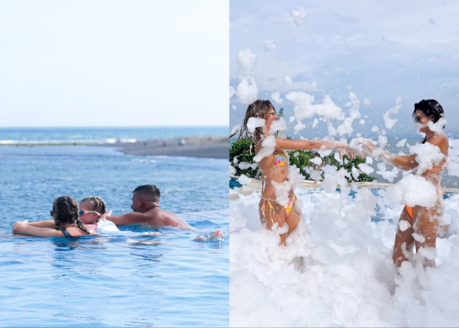 Family with kids swimming and having a foam party at Flamingo Beach Club in East Bali