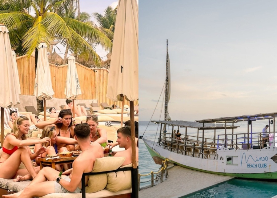 Group daybed and wooden boat seating at Minoo Beach Club on Melasti Beach in Ungasan, Uluwatu, Bali