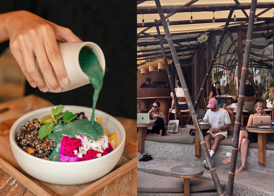 A colourful plant-based smoothie bowl with dragonfruit, granola and a blue-green dressing being poured over it at Alchemy in Uluwatu.