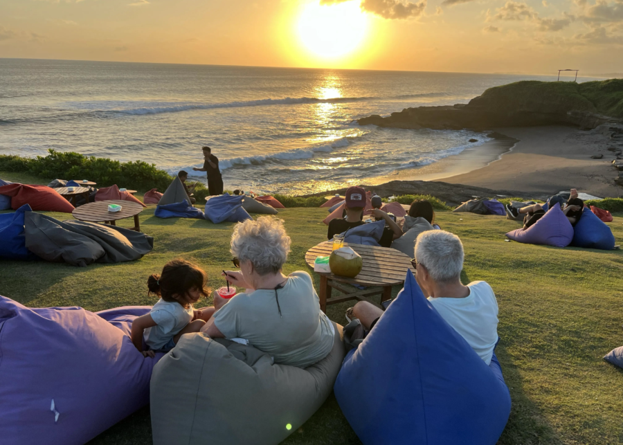 People enjoying the sunset in beanbags at Times Beach Warung - Best Sunset Bar in Canggu Bali