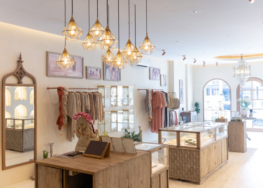 Inside Ananda Soul boutique in Sanur, Bali, Indonesia - with hanging lights, clothes and jewellery on display