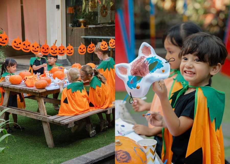 Kids painting pumpkins and masks for Halloween at From Here cafe in Sanur, Bali, Indonesia