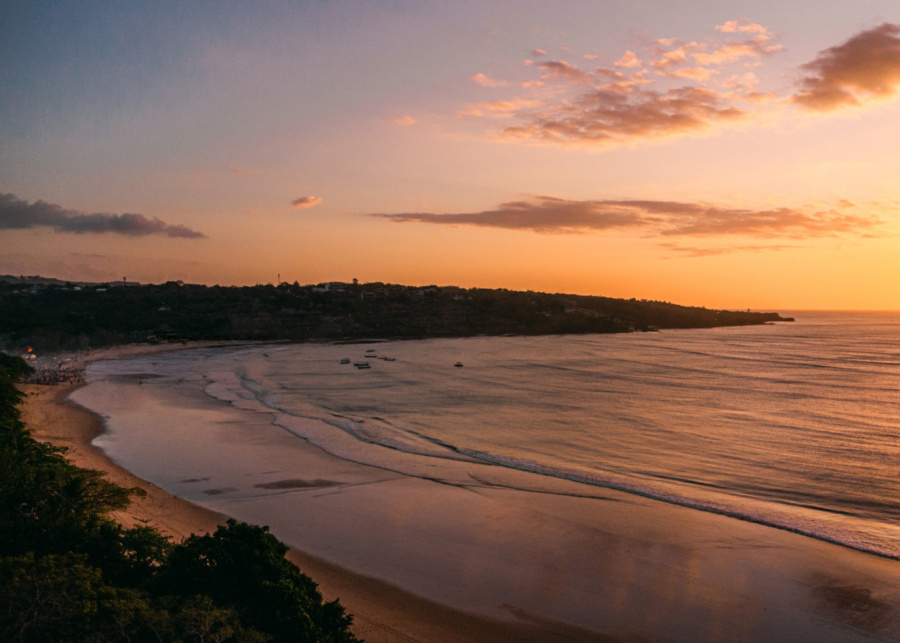 sunset on Jimbaran Bay beach in Bali, Indonesia