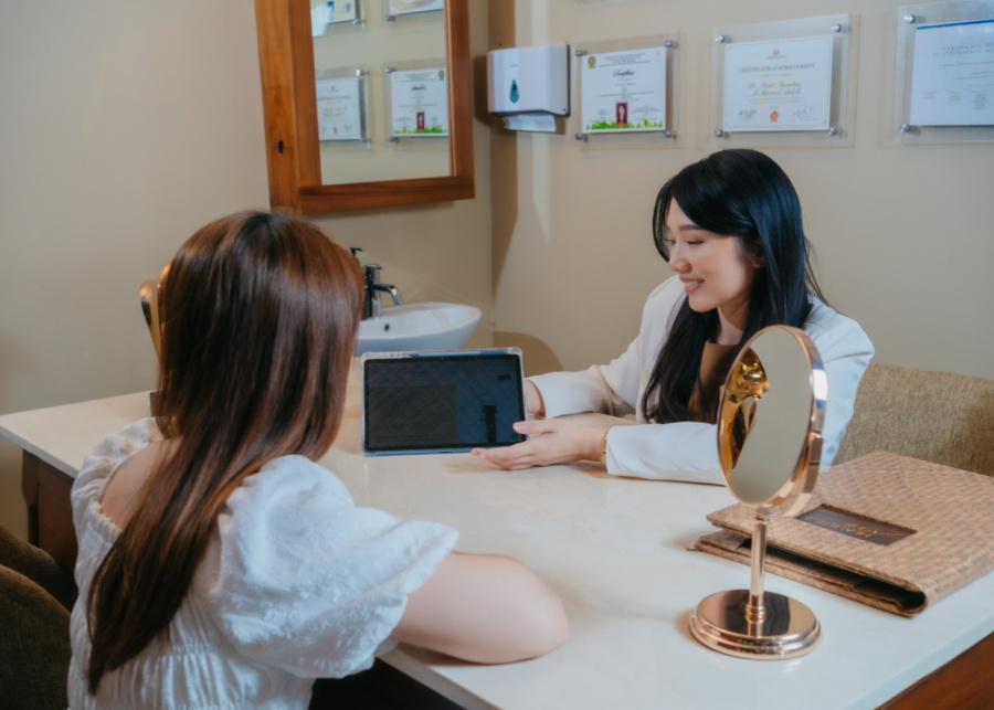 Doctor consultation with patient before treatment at Healthy Look Aesthetic medical spa in Bali, Indonesia , Ubud