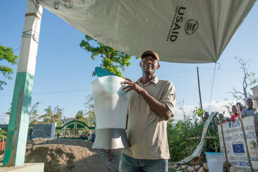 Rob Zimmerman interview Kohler man holding water filter system