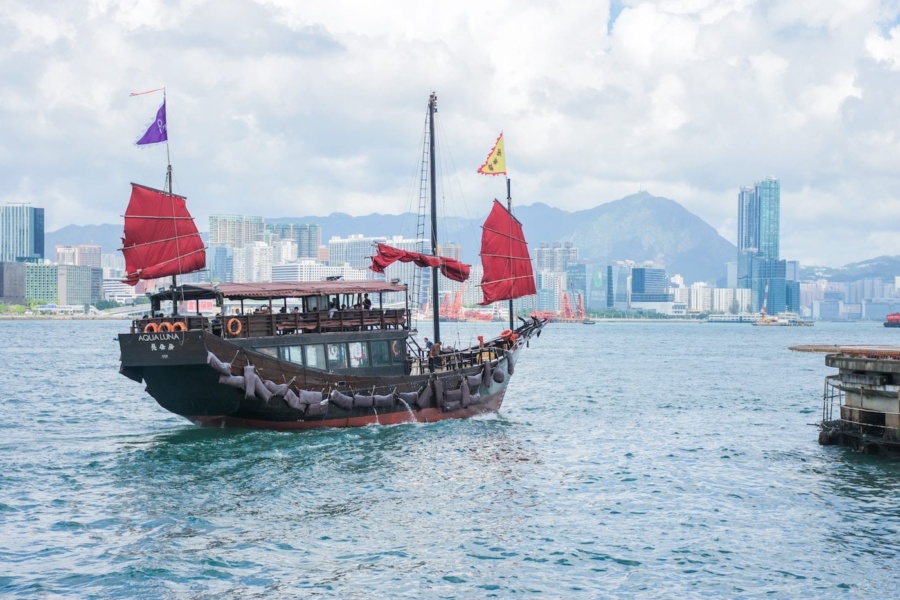 a boat in Victoria Harbour
