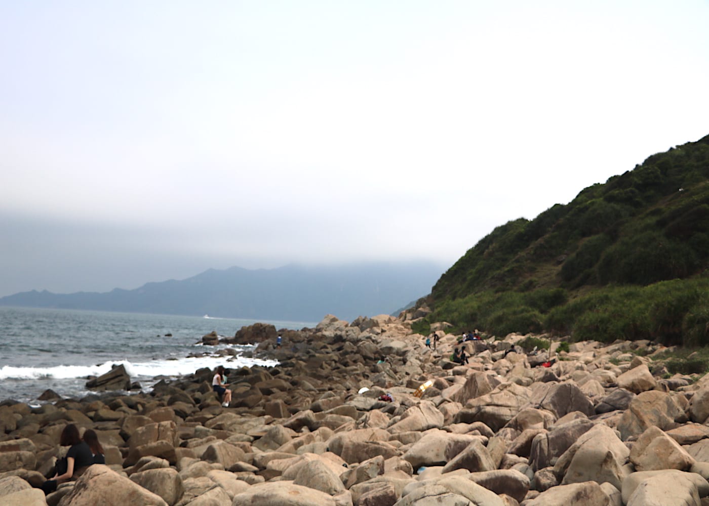 Umbrellas and beach mats out where to find hidden beaches in Hong Kong