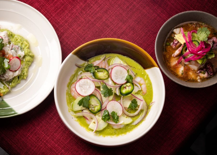 three bowls ceviche on table