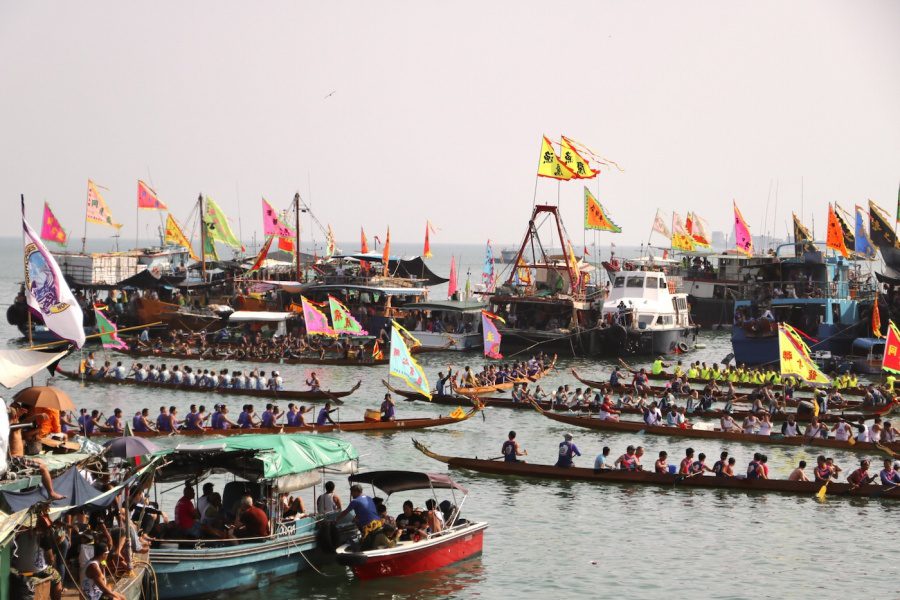 People watching the Dragon Boat race from sampans