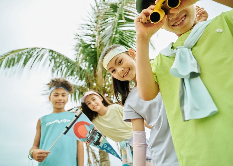 kids using binoculars and weating moody tiger