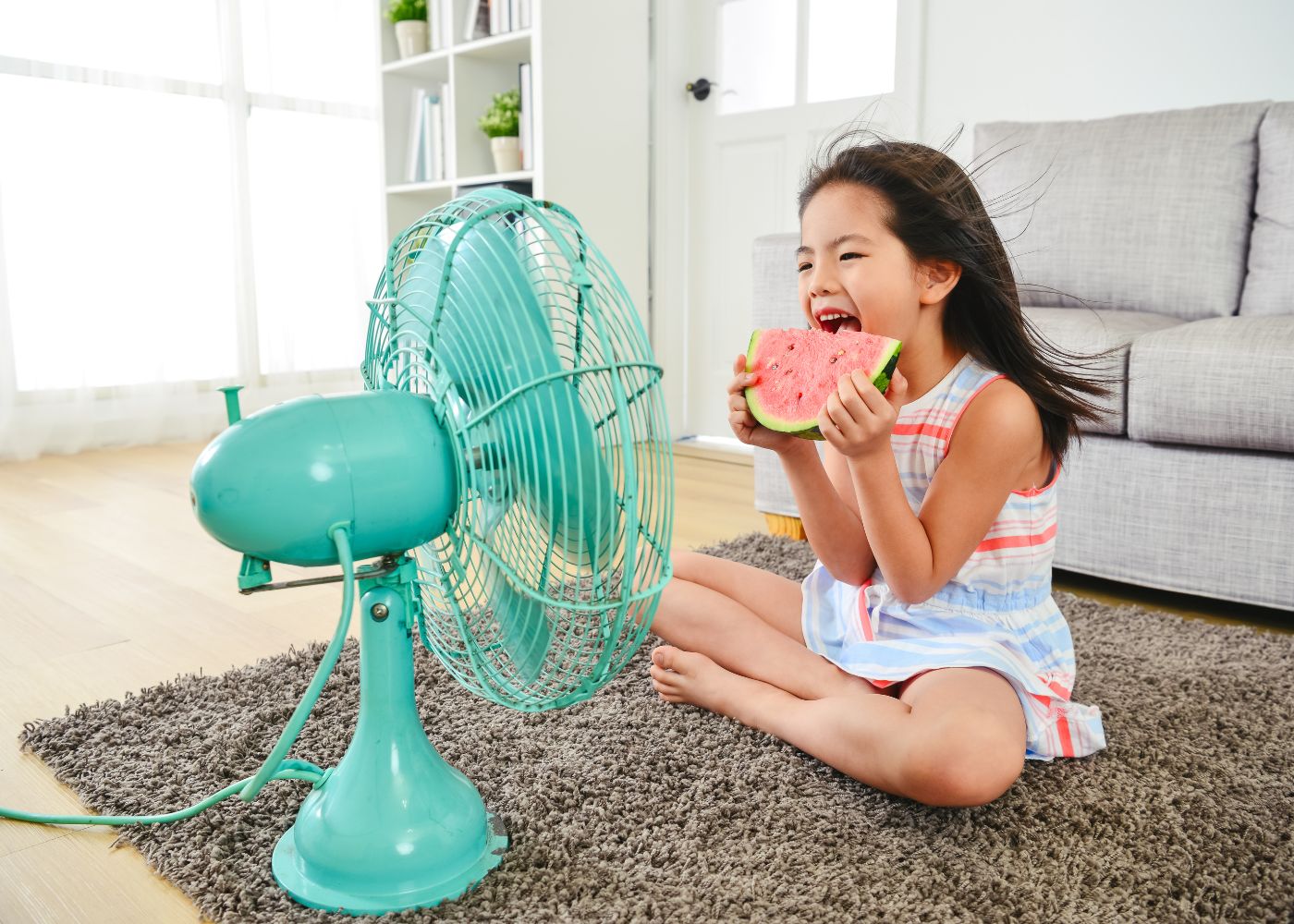 things to do when hot outside child eating watermelon