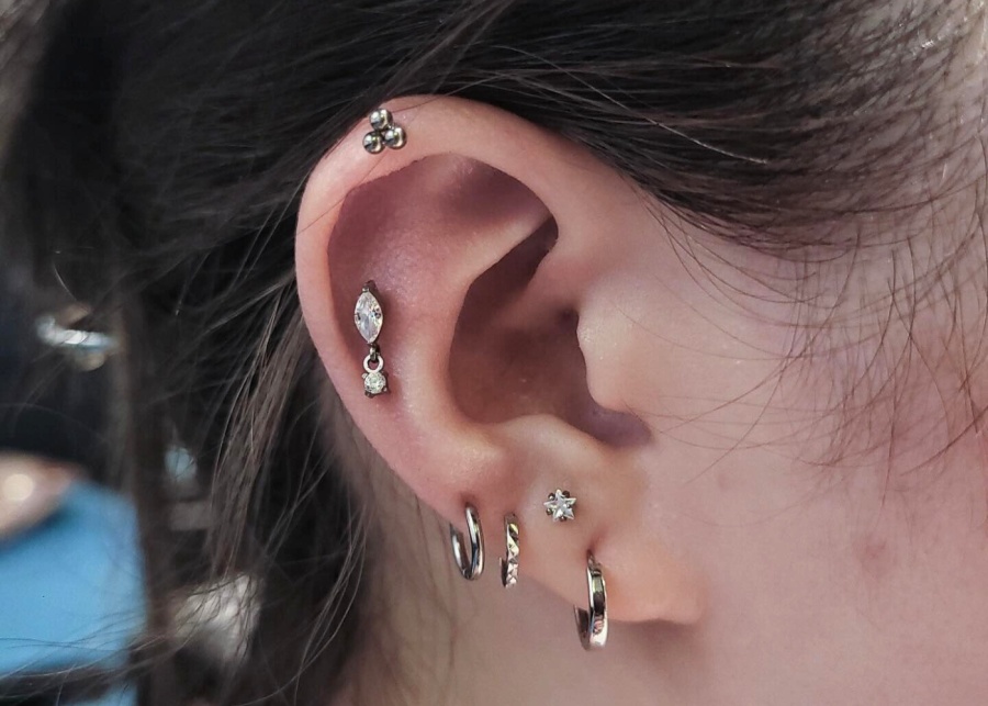 karma tattoo piercing
